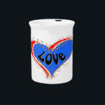 Love Pitcher<br><div class="desc">Put a little love in your heart this Fourth of July with this simple design. Love is written inside a red,  white,  and blue heart. The hearts are surrounded by gold and white stars. This makes a great gift and is appropriate for anyone.</div>