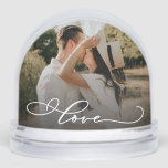 Love Simple Modern Script 2 Photo Snow Globe<br><div class="desc">This custom romantic photo snow globe with the word "Love" is a heartfelt gift choice for anniversaries, Valentine's Day, weddings, or just because. The elegant snow globe showcases a single custom photo with a graceful calligraphy-style "love" script across the photo, adding a tender and stylish touch. Designed to highlight your...</div>