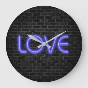 LOVE text in neon lights on brick Large Clock
