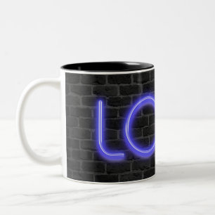 LOVE text in neon lights on brick Two-Tone Coffee Mug