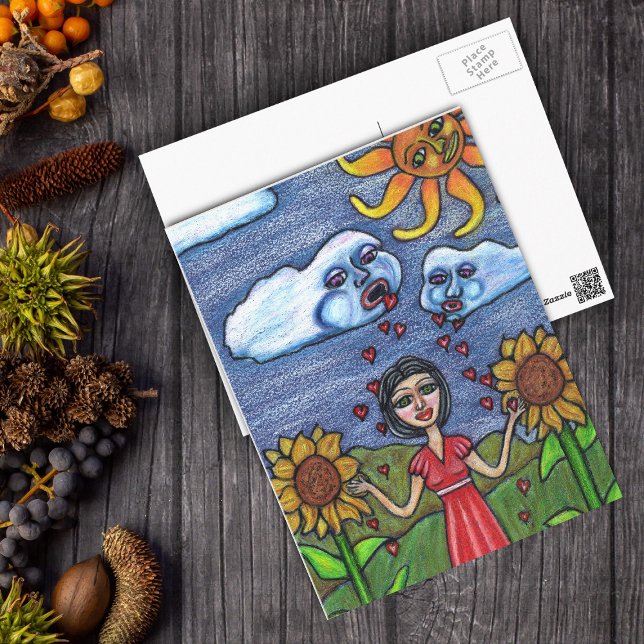 Love Will Make You Grow Postcard (Clouds raining red hearts down on lady in sunflowers with orange sun looking on postcard.)
