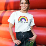Love Wins Rainbow Colors LGBTQ Pride Month T-Shirt<br><div class="desc">Celebrate Pride Month and show your support for the LGBTQ community with this colorful "LOVE WINS" t-shirt design with black modern text and a vibrant arched ROYGBV rainbow spectrum of colors.</div>