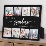 Love You Grandma 8 Photo Collage Black Plaque<br><div class="desc">Give Grandma a gift she'll cherish. This photo collage plaque features eight of her favorite square photos of the grandkids, along with the message "Love You Grandma." The word "grandma" appears in elegant white handwriting script with flourishes at the beginning and end on a black background. Add the names of...</div>