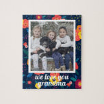 Love You Grandma Floral Photo Personalized Jigsaw Puzzle<br><div class="desc">This gorgeous puzzle featuring a navy,  coral yellow and orange floral pattern and a customizable photo area will bring a smile to your loved once's face. Text reads "love you grandma" in a white script font,  but can be customized.</div>