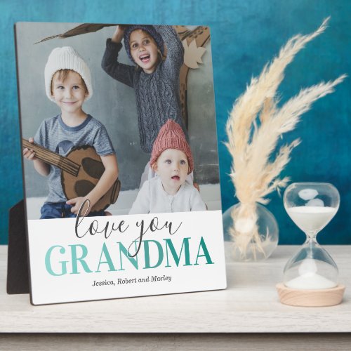 Love You Grandma Picture Plaque - Personalized grandmother photo plaque featuring a stylish white background that can be changed to any color, a precious photo of her grandchildren, the saying "love you grandma", and their names.