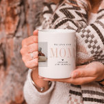Love You Mom | Two Photo Collage Coffee Mug<br><div class="desc">This simple and sweet mug says "We Love you Mom" in trendy, modern typefaces with a charming heart and a spot for names. Minimal two photo template of your favorite personal photos for a gift anyone would love. Mother's Day is the perfect opportunity to show ALL the moms in our...</div>