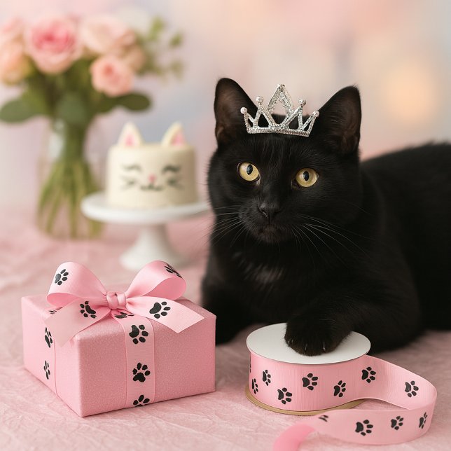Love Your Cat Pink Paw Print Craft Ribbon (Tiara‑wearing black cat claims a pink paw‑print ribbon beside a sparkle‑wrapped gift.)