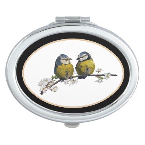 Lovebirds sitting on a cherry blossom branch black compact mirror