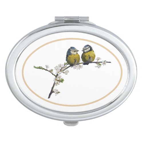 Lovebirds sitting on a cherry blossom branch compact mirror