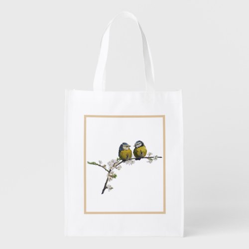 Lovebirds sitting on a cherry blossom branch grocery bag