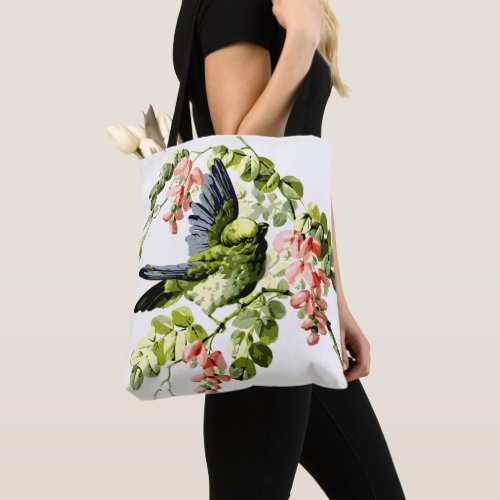 Lovely Young Parrot in Flowering Tree Tote Bag