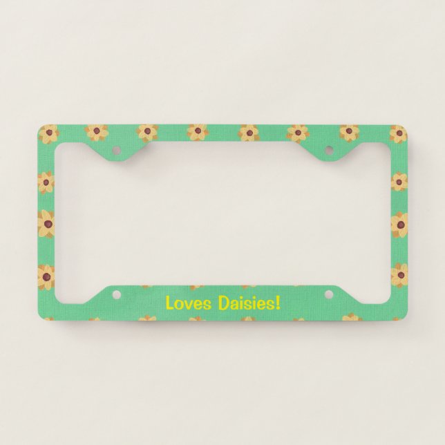 Loves daisies, yellow daisies on green license plate frame (Front)