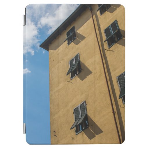 LOW ANGLE PHOTOGRAPHY OF BROWN LOUVER WINDOW iPad AIR COVER
