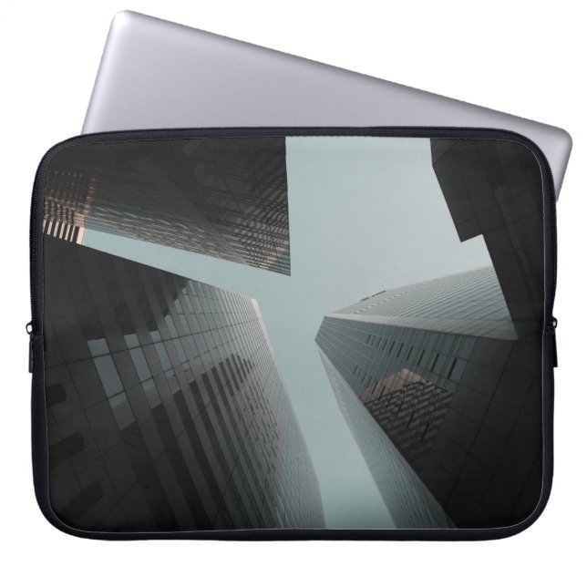 LOW ANGLE PHOTOGRAPHY OF BUILDINGS AT DAYTIME LAPTOP SLEEVE (Front)
