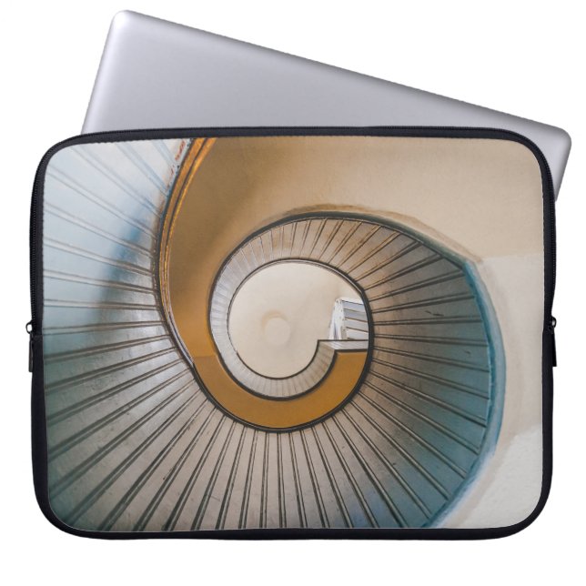 Low angle photography of spiral ladder laptop sleeve (Front)