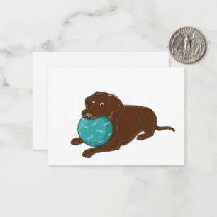 LR chocolate lab chewing ball cartoon Note Card