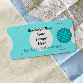 Lt Blue / Teal Flower Ribbon by Kenneth Yoncich License Plate