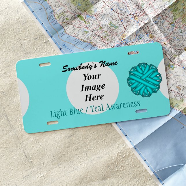 Lt Blue / Teal Flower Ribbon by Kenneth Yoncich License Plate (In Situ)