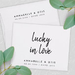 Lucky in Love | Minimalist Wedding Lottery Ticket Envelope<br><div class="desc">Simple, stylish "lucky in love" wedding day favor envelope in a modern minimalist design style with a handwritten script typography in classic black and white written in an informal casual style. The text can easily be personalized for a unique one of a kind design for your special day. The perfect...</div>