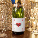 Lucky In Love Playing Card Couples Shower Favor Sparkling Wine Label<br><div class="desc">Elevate your couples shower with our custom 'Lucky In Love' bottle labels! Embrace the whimsy of a playing card-inspired design, adorned with iconic heart King and Queen symbols, all rendered in bold red, white, and black hues. Make a statement with personalized text, prominently featuring the endearing phrase 'Lucky In Love'...</div>