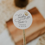 Lucky in Love | Rustic Horseshoes Wedding Favor Classic Round Sticker<br><div class="desc">Rustic design for country,  equestrian,  or ranch weddings features dark plum brown lettering with script accents,  with "lucky in love" and your names,  and a pair of golden watercolor horseshoes.</div>