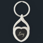 Lucy white gold Handwriting key Keychain<br><div class="desc">A very beautiful personalized key ring as heart for Lucy. The name as text on the metal key trailer in heart form is designed in white gold lettering writing design, modifiable and also transferable to other products. Perfect for you, your best friend, wife, sister, mother, aunt, grandma, fiancée, cousin, partner...</div>