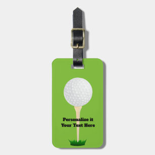 luggage tag golf ball and tee on green