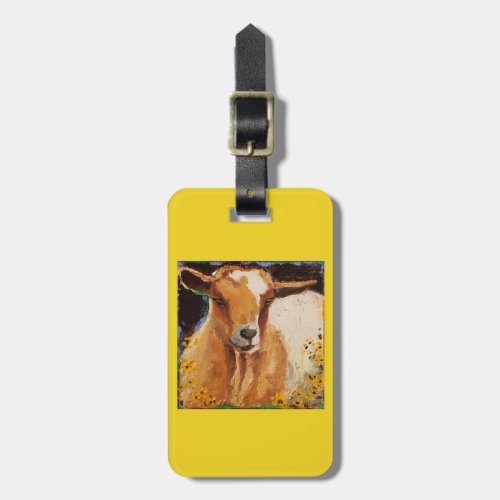 luggage tag with white and tan goat