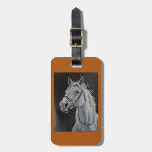 luggage tag with white horse