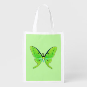 Luna moth on a pale green background grocery bag