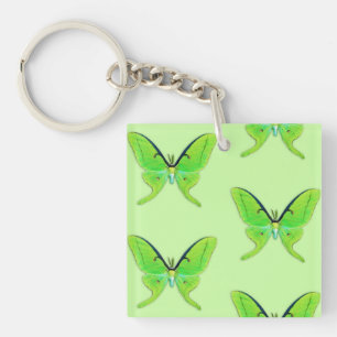 Luna moth on a pale green background keychain