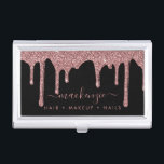 Luxury Black and Rose Gold Sparkle Glitter Drips Business Card Case<br><div class="desc">Rose Gold Sparkle Glitter Drips Luxury Business Card Case featuring faux glitter dripping in blush pink, rose gold luxury on a classic black background. You're dripping in luxury, so your business cards should be, too! Easy to customize! Feel free to contact us at cedarandstring@gmail.com if you need assistance with the...</div>