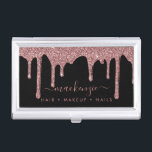 Luxury Black and Rose Gold Sparkle Glitter Drips Business Card Case<br><div class="desc">Rose Gold Sparkle Glitter Drips Luxury Business Card Case featuring faux glitter dripping in blush pink, rose gold luxury on a classic black background. You're dripping in luxury, so your business cards should be, too! Easy to customize! Feel free to contact us at cedarandstring@gmail.com if you need assistance with the...</div>