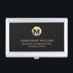 Luxury Black Leather Gold Monogram Business Card Case<br><div class="desc">Elevate your professional look with this stylish and practical business card case. Featuring a brushed monogram medallion with your name company and title in classic block typography, this case is a great way to keep your business cards organized and protected. The black leather print background adds a touch of sophistication,...</div>