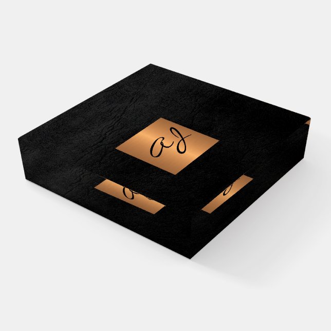 Luxury elegant black and gold monogrammed office paperweight (Angled)