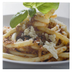 Macaroni with mince sauce and cheese tile