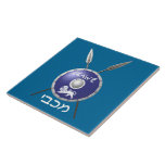 Maccabee Shield And Spears Ceramic Tile<br><div class="desc">A depiction of a Maccabee's shield and two spears. The shield is adorned by a lion and text reading "Yisrael" (Israel) in the Paleo-Hebrew alphabet. "Maccabee" also appears in modern Hebrew. The Maccabees were Jewish rebels who freed Judea from the yoke of the Seleucid Empire. Chanukkah is not just a...</div>