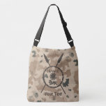 Maccabee Shield And Spears - Desert Crossbody Bag<br><div class="desc">A military brown "subdued" style depiction of a Maccabee's shield and two spears on a desert camo background. The shield is adorned by a lion and text reading "Yisrael" (Israel) in the Paleo-Hebrew alphabet. Add your own text. The Maccabees were Jewish rebels who freed Judea from the yoke of the...</div>