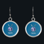 Maccabee Shield And Spears Earrings<br><div class="desc">A depiction of a Maccabee's shield and two spears. The shield is adorned by a lion and text reading "Yisrael" (Israel) in the Paleo-Hebrew alphabet. Modern Hebrew text reading "Maccabee" also appears. You may change the background color. The Maccabees were Jewish rebels who freed Judea from the yoke of the...</div>