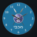 Maccabee Shield And Spears Large Clock<br><div class="desc">A depiction of a Maccabee's shield and two spears. The shield is adorned by a lion and text reading "Yisrael" (Israel) in the Paleo-Hebrew alphabet. "Maccabee" also appears in modern Hebrew. The Maccabees were Jewish rebels who freed Judea from the yoke of the Seleucid Empire. Chanukkah is not just a...</div>