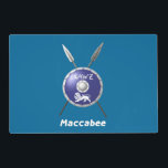 Maccabee Shield And Spears Placemat<br><div class="desc">A depiction of a Maccabee's shield and two spears. The shield is adorned by a lion and text reading "Yisrael" (Israel) in the Paleo-Hebrew alphabet. English text reading "Maccabee" also appears. Customizable text reading "Happy Chanukkah! appears on the reverse side. The Maccabees were Jewish rebels who freed Judea from the...</div>
