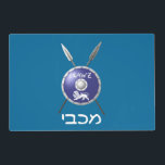 Maccabee Shield And Spears Placemat<br><div class="desc">A depiction of a Maccabee's shield and two spears. The shield is adorned by a lion and text reading "Yisrael" (Israel) in the Paleo-Hebrew alphabet. "Maccabee" also appears in modern Hebrew. Customizable text reading "Happy Chanukkah! appears on the reverse side. The Maccabees were Jewish rebels who freed Judea from the...</div>