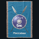 Maccabee Shield And Spears Throw Blanket<br><div class="desc">A depiction of a Maccabee's shield and two spears. The shield is adorned by a lion and text reading "Yisrael" (Israel) in the Paleo-Hebrew alphabet. English text reading "Maccabee" also appears. The Maccabees were Jewish rebels who freed Judea from the yoke of the Seleucid Empire. Chanukkah is not just a...</div>