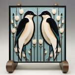 Mackintosh Black Birds Art Deco Nouveau Wall Decor Ceramic Tile<br><div class="desc">This ceramic tile features two black birds and intricate floral patterns reminiscent of the iconic style of Mackintosh. He was a prominent Scottish architect, designer, and artist of the Art Nouveau movement. Clean lines, geometric shapes, and a strong sense of symmetry characterize his work. These elements are beautifully represented in...</div>