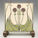 Mackintosh Rose & Birds Art Nouveau Minimalist Ceramic Tile<br><div class="desc">Inspired by Mackintosh, I created a calm, modern interpretation of his Art Nouveau designs. Two stylized birds mirror each other in an elegant frame, surrounding slender stems topped with three geometric rose blooms. Clean black linework, soft blush roses, and muted sage-green leaves create a serene, airy look that works beautifully...</div>