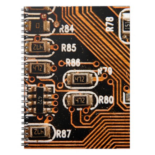 macro shot of circuitboardcablescapacitorscard notebook