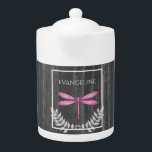 Magenta Dragonfly Rustic Teapot<br><div class="desc">Enjoy your tea with a Magenta Dragonfly Rustic Personalized Teapot.  Teapot design features a vibrant dragonfly adorned with delicate foliage against a dark gray rustic wooden background.  Additional gift items available with this design as well as a variety of colors.</div>