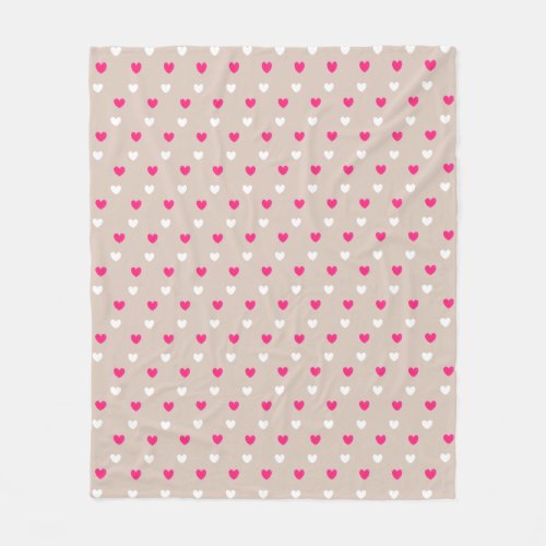 Magenta red and white hearts on beige fleece blanket