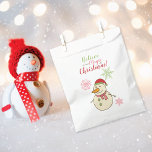 Magic of Christmas Snowman Favor Bag<br><div class="desc">A favor bag designed for Christmas treats,  featuring an adorable snowman adorned with a red Santa hat and carrot nose,  surrounded by snowflakes,  and bearing the phrase - Believe in the Magic of Christmas!</div>