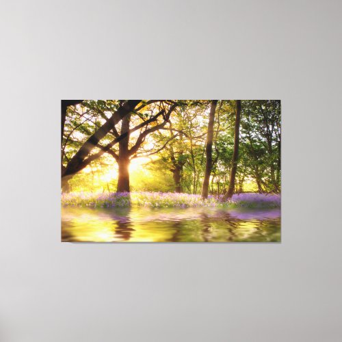 Magical pond in bluebell forest canvas print